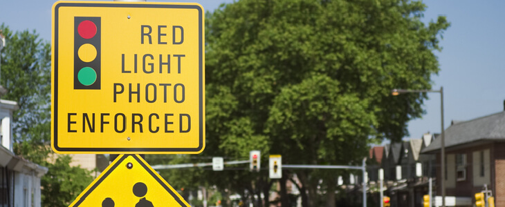 Red Light photo enforced sign