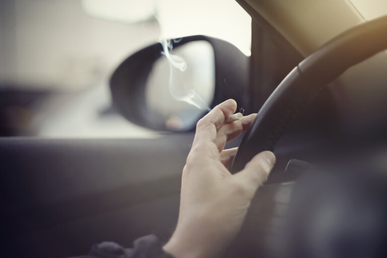 man smoking marijuana while driving
