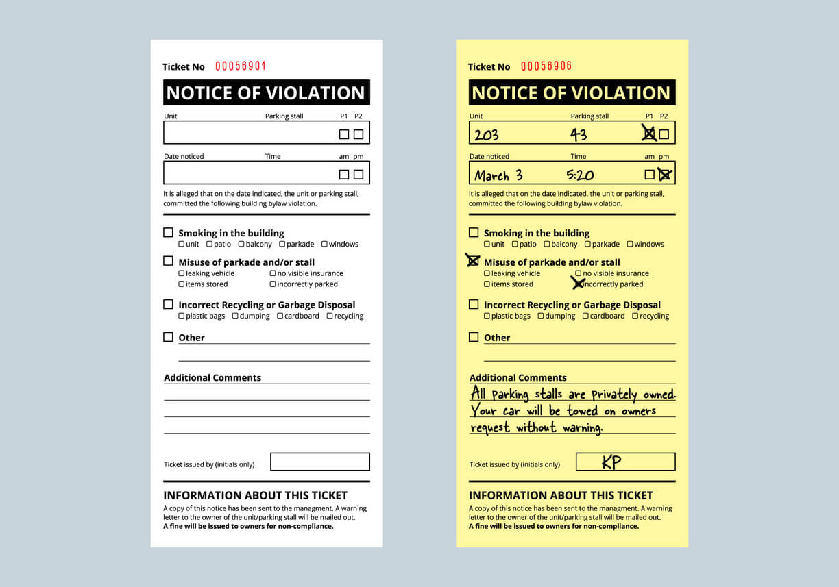 Two traffic tickets laid side by side