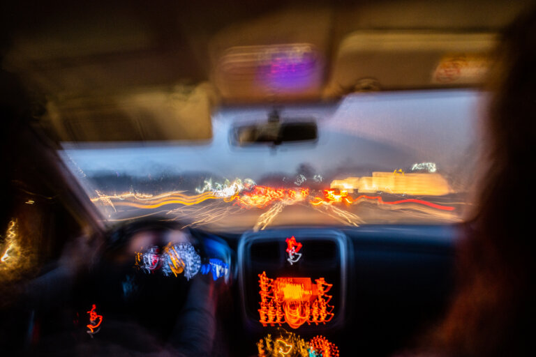 Blurred photo from inside a car at night